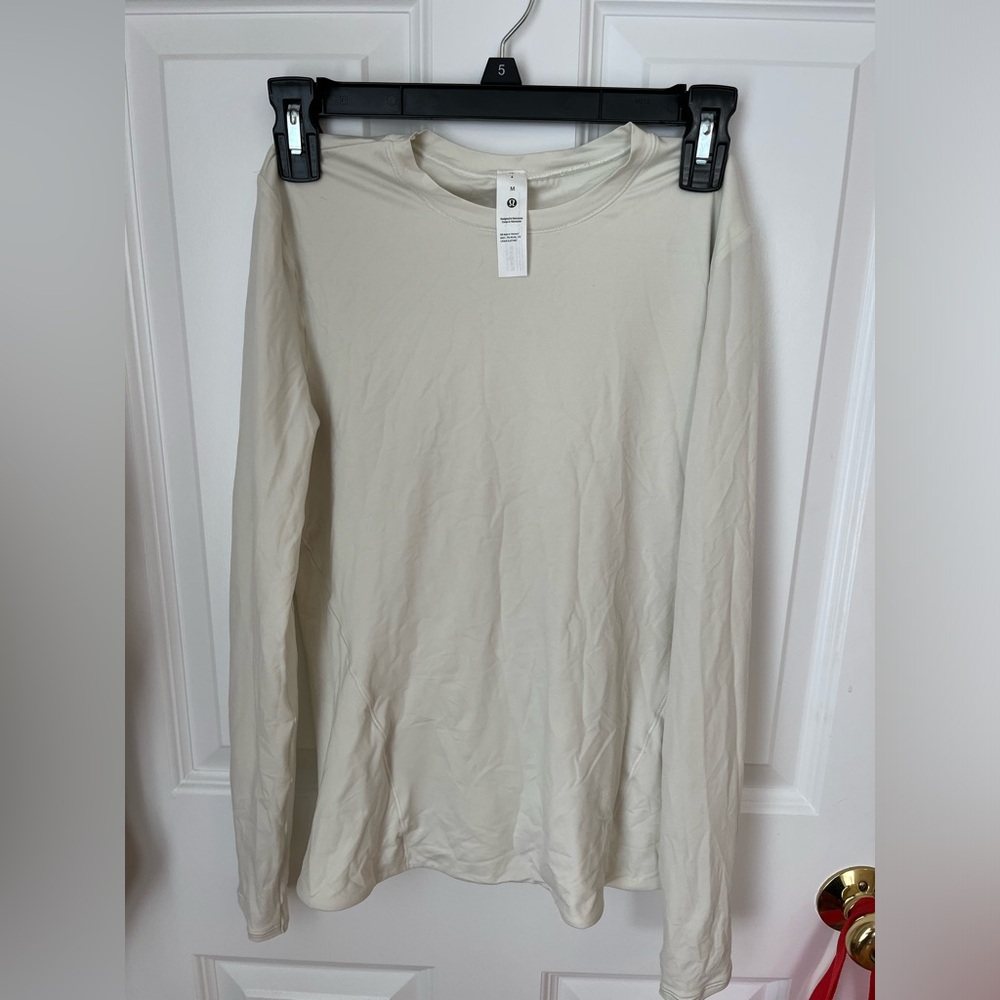 Lululemon off white long sleeve. Never Worn